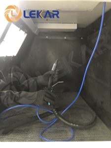 hinh-anh-buong-may-phun-cat-lam-sach