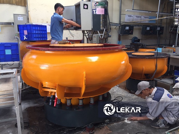 Deburring metal using machinery